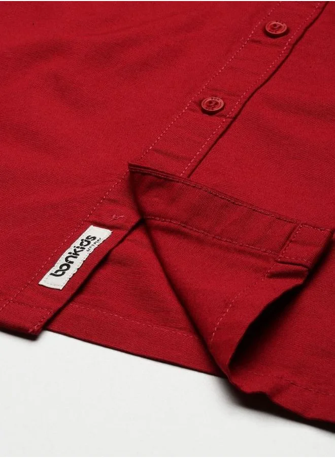 بونكيدز Boy's shirts in regular fit red colour cotton fabric embellished pattern pull over closure woven weave type round collar type round neckline half sleeve length button down upper body wear type suitable for casual occasions – bring home style that tells a story.