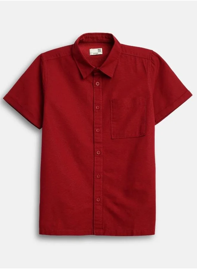 Bonkids Boy's shirts in regular fit red colour cotton fabric embellished pattern pull over closure woven weave type round collar type round neckline half sleeve length button down upper body wear type suitable for casual occasions – bring home style that tells a story.