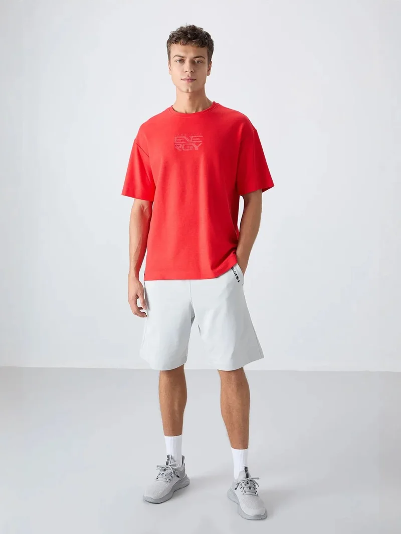 TOMMYLIFE TOMMY Oversized Logo Embroidered Cotton-Blend T-Shirt