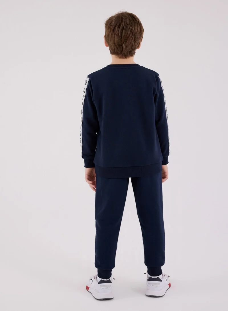 يو اس بولو اسن طقم جمبسوت أولاد يو إس بولو أسن. كحلي