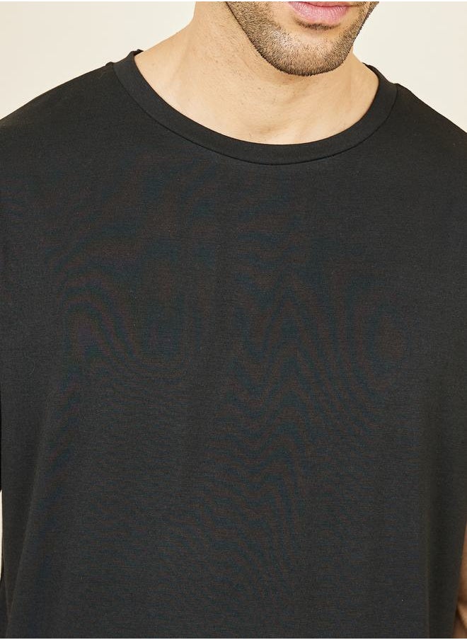 Styli - Solid Crew Neck T-shirt and Boho Print Shorts Set - Image 1