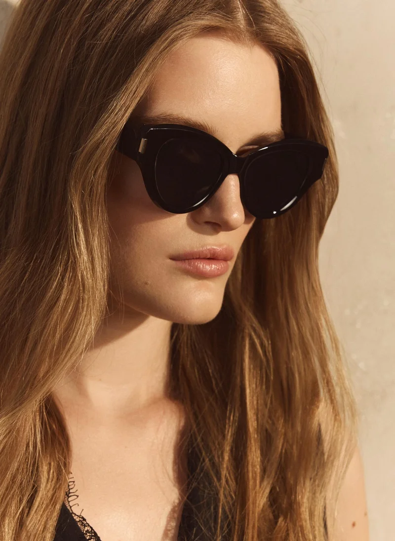 Sunglasses in plastic frames with large lenses