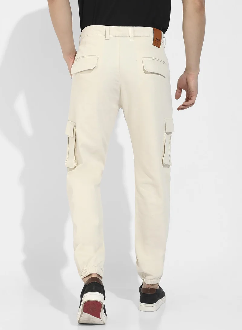 Campus Sutra Men's Pale Yellow Cuffed Hem Cargo Trousers