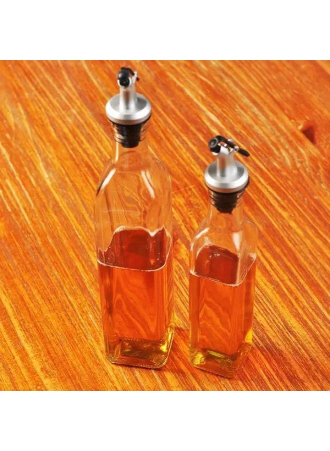 طقم زجاجات زيت وخل زجاجية – 2 قطعة بفوهة سكب معدنية - Image 2