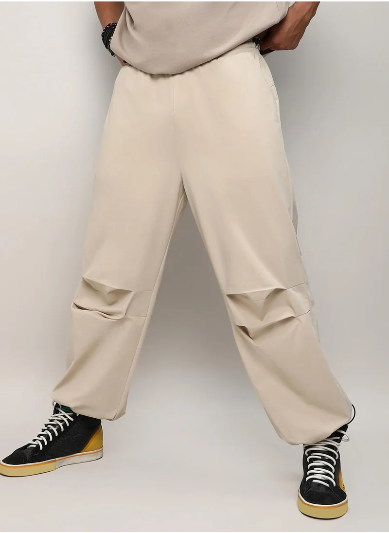 Campus Sutra Men's Off-White Solid Parachute Trousers