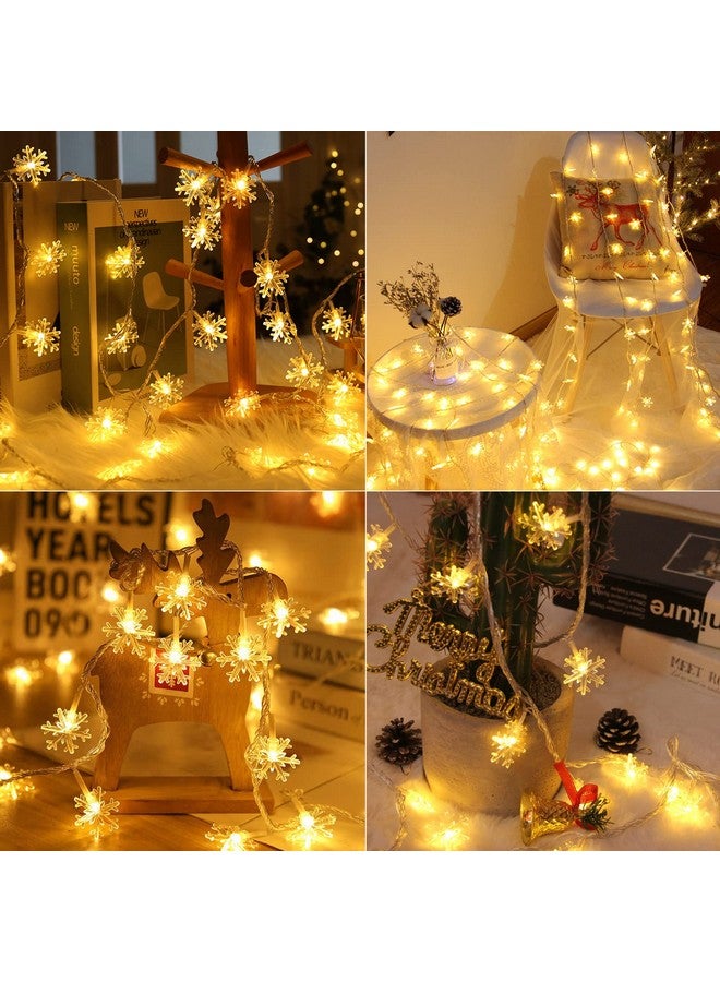 برايتاون سلسلة أضواء ندفة الثلج الشمسية من Brightown، 100 مصباح LED بطول 39 قدمًا، مصابيح خرافية خارجية مقاومة للماء مع 8 أوضاع إضاءة لحفلات الزفاف والحفلات والأشجار والغرف والحدائق والفناء والمنزل، باللون الأبيض الدافئ - Image 2