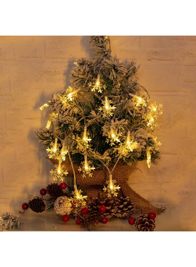 برايتاون سلسلة أضواء ندفة الثلج الشمسية من Brightown، 100 مصباح LED بطول 39 قدمًا، مصابيح خرافية خارجية مقاومة للماء مع 8 أوضاع إضاءة لحفلات الزفاف والحفلات والأشجار والغرف والحدائق والفناء والمنزل، باللون الأبيض الدافئ - Image 5