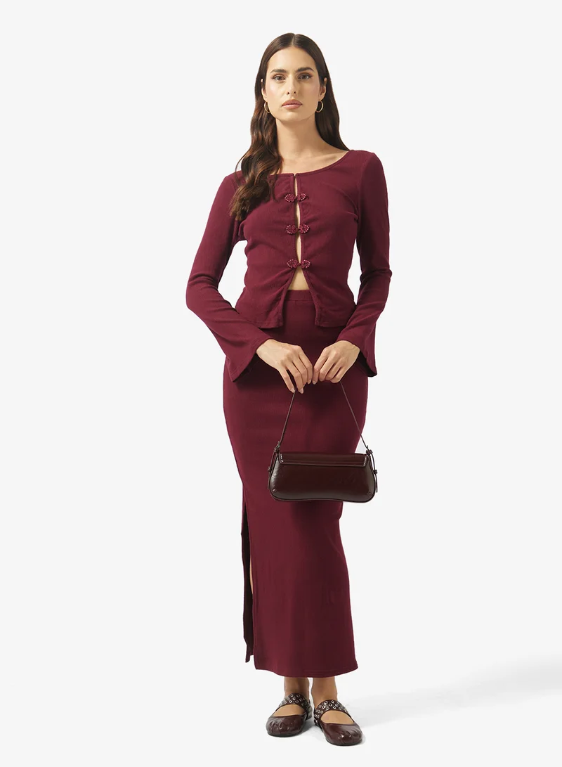 ايلا طقم بلوزة وتنورة مضلعة