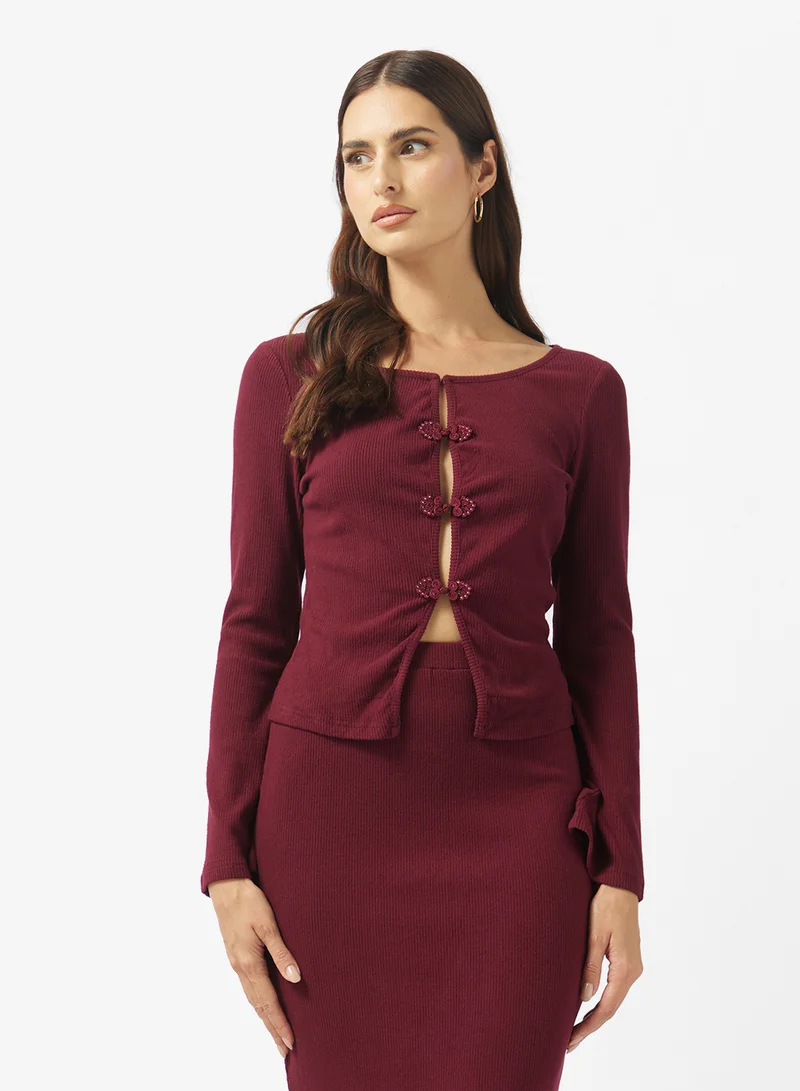 ايلا طقم بلوزة وتنورة مضلعة