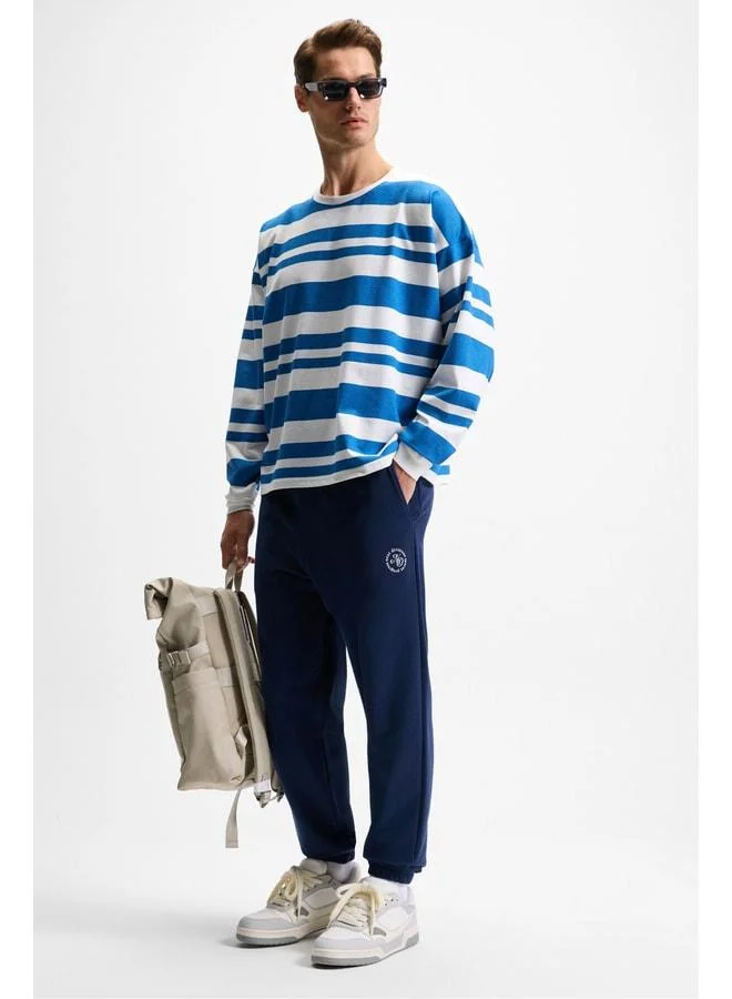 GRIMELANGE YOANE Men's Drawstring Elastic Waist and Cuff Navy Tracksuit Pants.