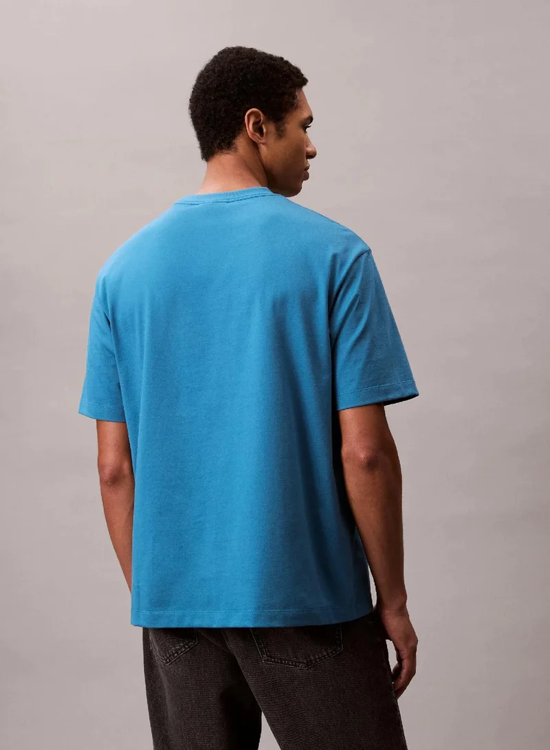 Calvin Klein Jeans Bluesteel Calvin Klein Logo Relaxed Tee for Men | Best Price UAE