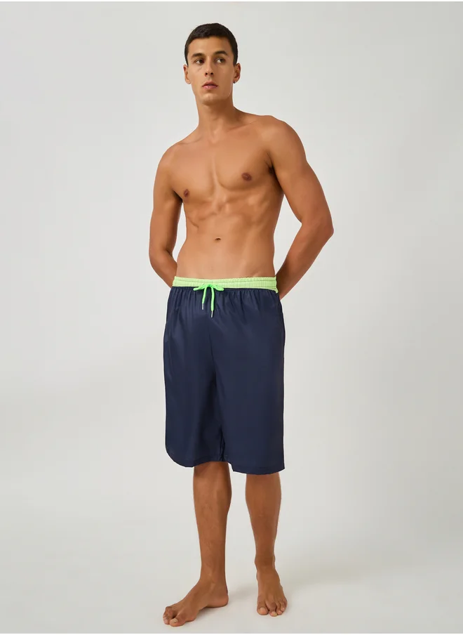 Styli Solid Regular Fit Swim Shorts with Contrast Waistband