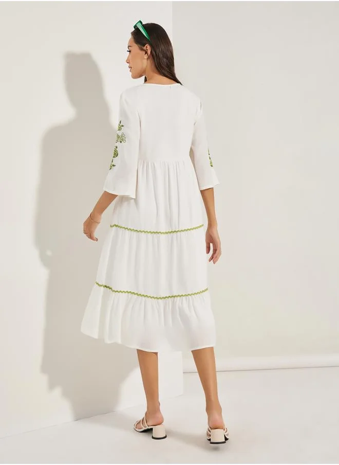 ستايلي Embroidered Panel Tie Tassel Midi Dress