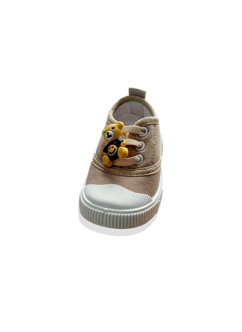 Kids shoes with bear decorations