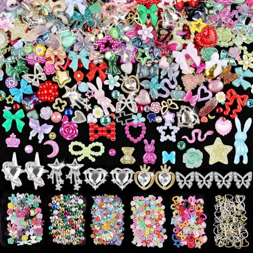 editTime 650pcs Mixed 3D Nail Charms Kit, 12pcs Luxury Metal Nail Rhinestones and 250pcs Resin Butterfly Flower Star Heart Bow Charms with 400pcs Flatback Pearls Rhinestone Metal Gems Charms (Mixed Color) - Image 1