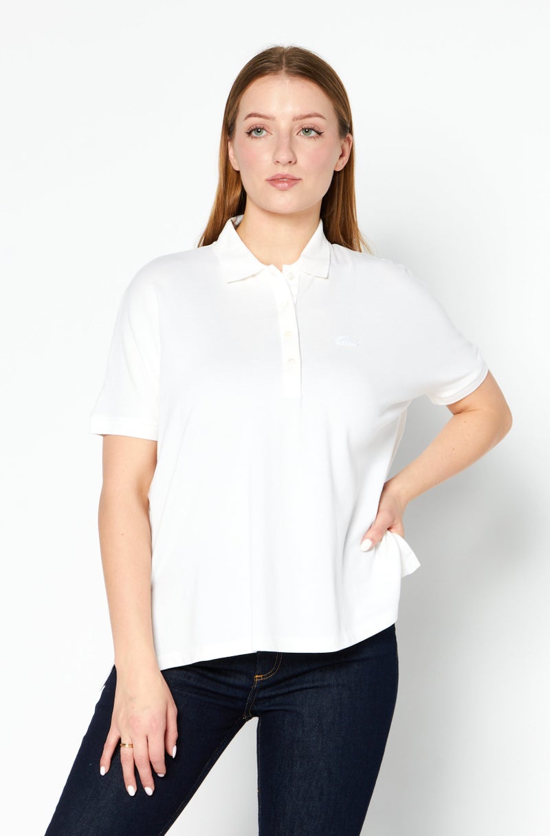 LACOSTE Women Relaxed Fit Brand Logo Short Sleeve Polo Shirts, Light Cream - Image 1