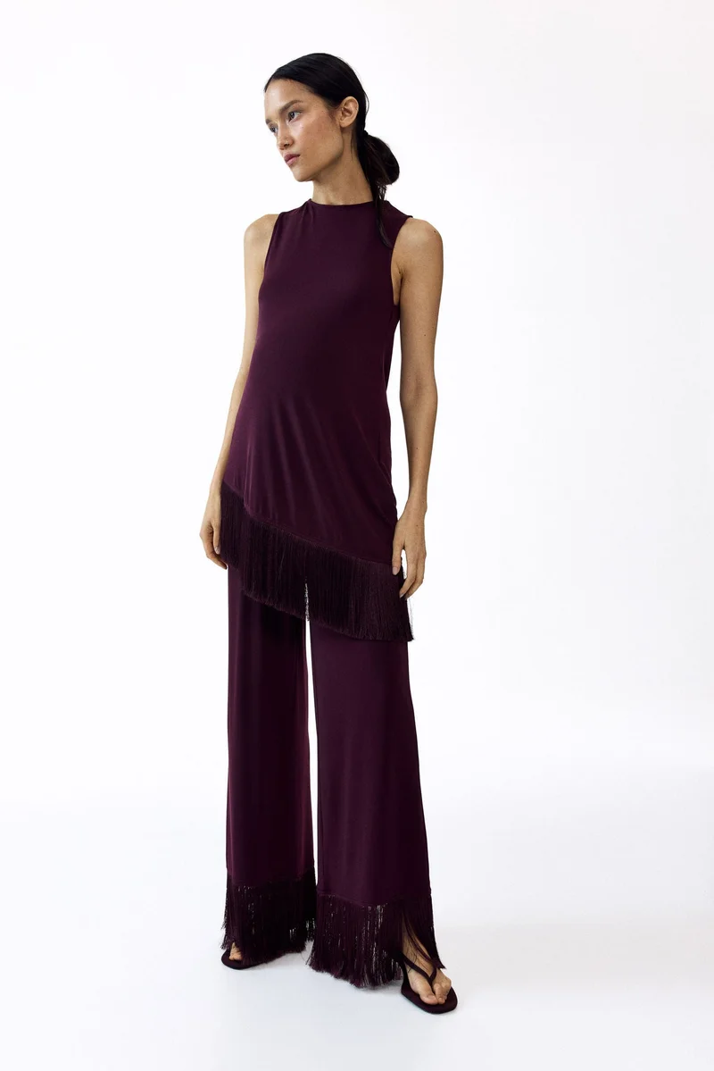 MAMA Asymmetric fringe-trimmed top