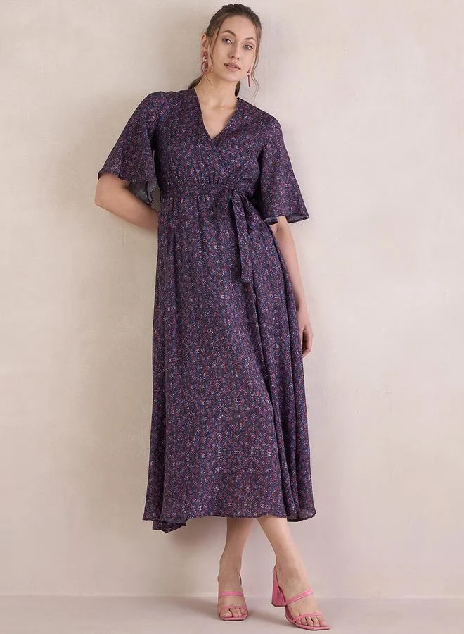 Femmella Floral Print V-Neck Wrap Maxi Dress with Tie-Up Belt by Styli