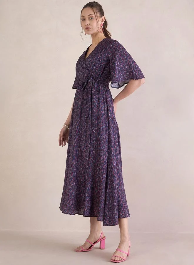 Femmella Floral Print V-Neck Wrap Maxi Dress with Tie-Up Belt by Styli