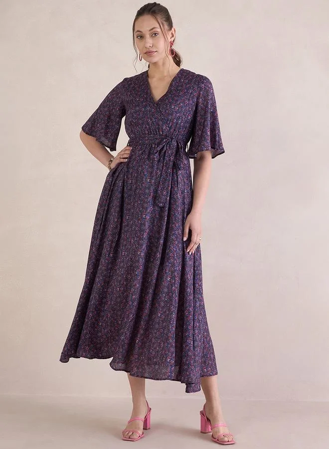 Femmella Floral Print V-Neck Wrap Maxi Dress with Tie-Up Belt by Styli