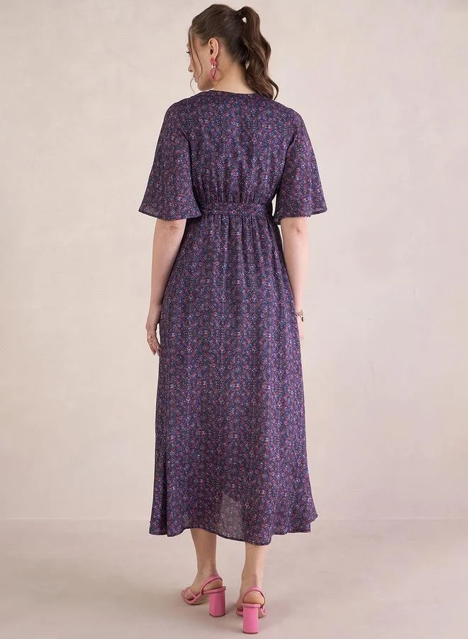 Femmella Floral Print V-Neck Wrap Maxi Dress with Tie-Up Belt by Styli