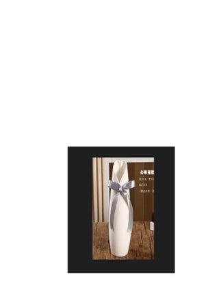 White vase - https://f.nooncdn.com/p/pzsku/ZCE400296915E16C42653Z/45/_/1728475153/dd951962-d182-481d-a6e8-d943322b2543.jpg