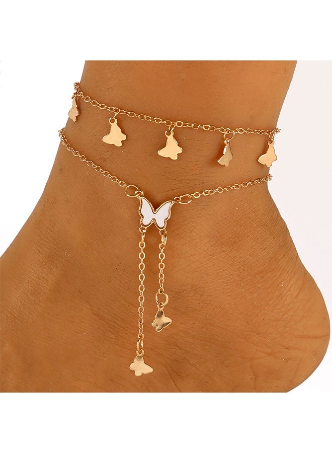 Happy D A luxurious double-layer stainless steel anklet, gold-plated and adorned with rhinestones and a butterfly charm. - Image 1