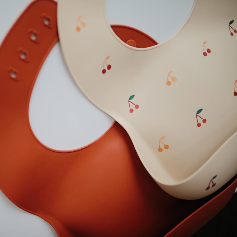 mushie Silicone Baby Bib | Adjustable Fit Waterproof Bibs (Cherries) - Image 2