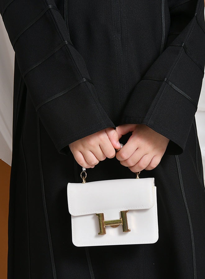 HAWRAA ABAYA Ratal Abaya | Black daily closed with snaps decorated with black ribbons - Image 2