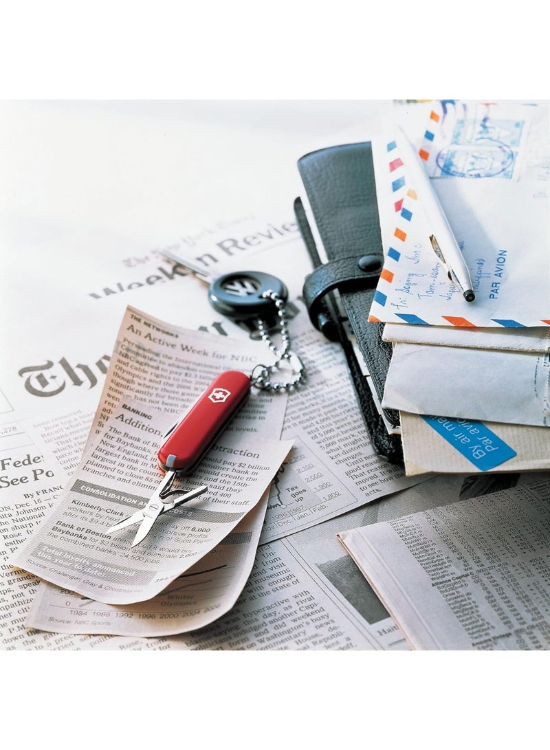 Victorinox Swiss Army Knife - Fresh. Stylish. Colorful Swiss Classics - 7 Function, Multi-Utility Tool with a Pair of Scissors - Red, 58 mm, M - Image 4