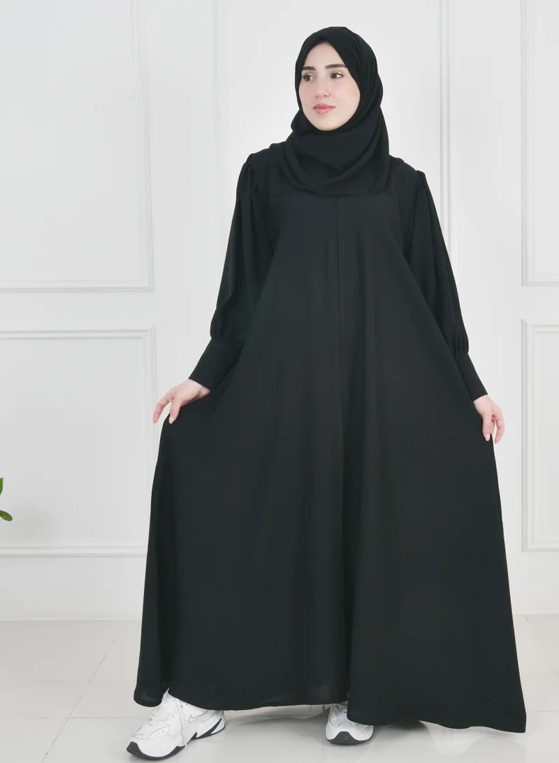 HAWRAA ABAYA Black quarter-length abaya with narrow, practical sleeves that close with snaps