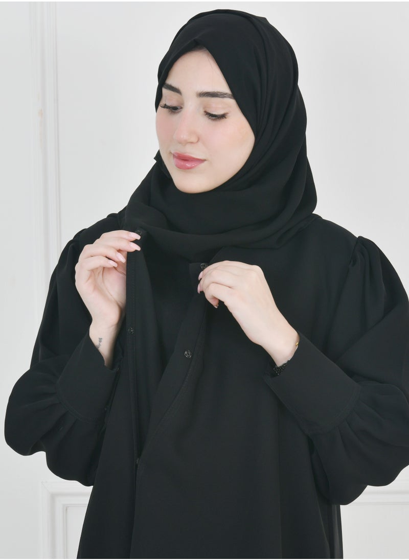 HAWRAA ABAYA - Black quarter-length abaya with narrow, practical sleeves that close with snaps - Image 1