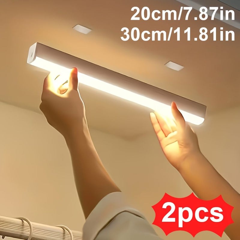 2 عبوات ضوء خزانة LED يعمل بالحركة وقابل للشحن 20 سم 7.87 بوصة أبيض، إضاءة لاسلكية أسفل الخزانة، ضوء ليلي مغناطيسي قابل للالتصاق، لغرفة التخزين والمطبخ والممر وبئر السلم في الخزانة. - Image 1