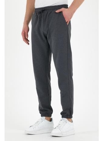 Multi-Colored 4-Piece Men's Sweatpants with Label, Back and Side Pockets, Regular Fit Rubber Legs - pzsku/ZCE867D3555AF6E66A181Z/45/_/1741264737/73469a10-42fd-4578-98e7-3a029a2c16a3