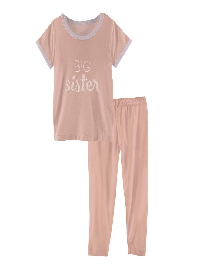 Kic Kee Pants طقم بيجاما بأكمام قصيرة من كيكي بانتس للأشقاء، الأخ الأكبر والأخت الكبرى (لون وردي فاتح - مقاس 2T) - Image 1