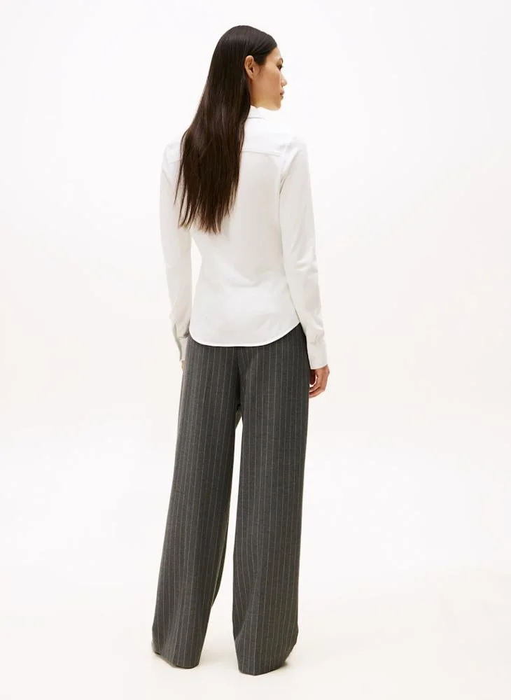 تومي هيلفيغر قميص بيكيه بأكمام طويلة نحيف لعام