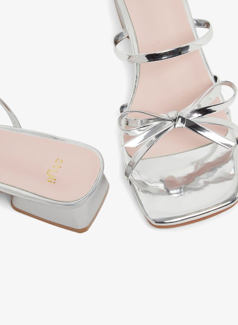 ستايلي صنادل بكعب عريض مزينة بفيونكة معدنية وأشرطة - Image 3