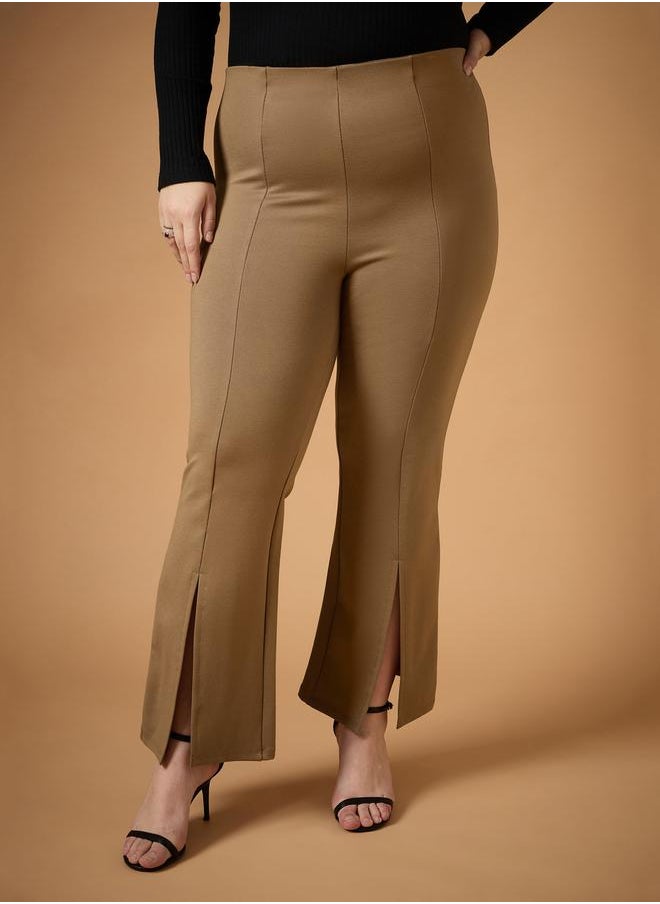 SASSAFRAS Plus Size Front Slit Detail Flared Pants by Styli  - Image 1