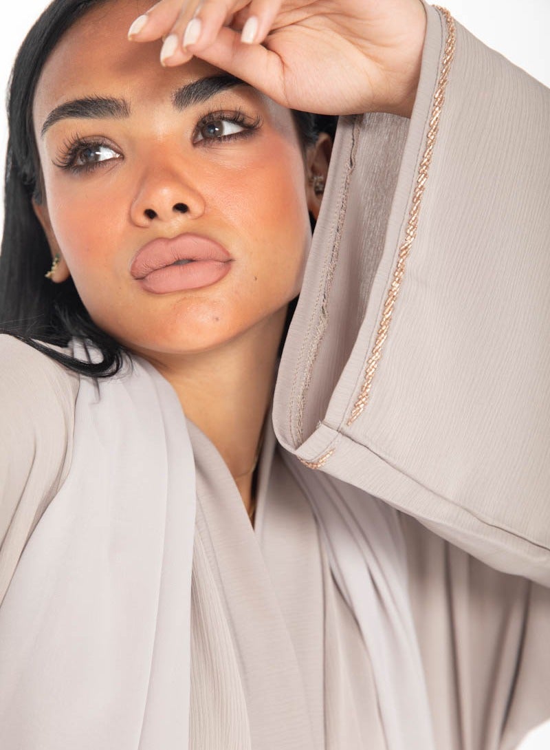 Aara Beige Abaya with Pleats and Gold Embellishments - Image 4