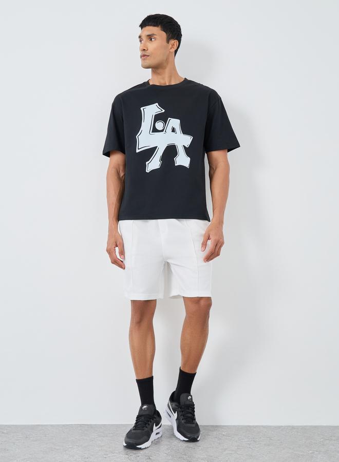 ستايلي تي شيرت أوفر سايز بياقة دائرية وطبعة شعار ستايلي - Image 2