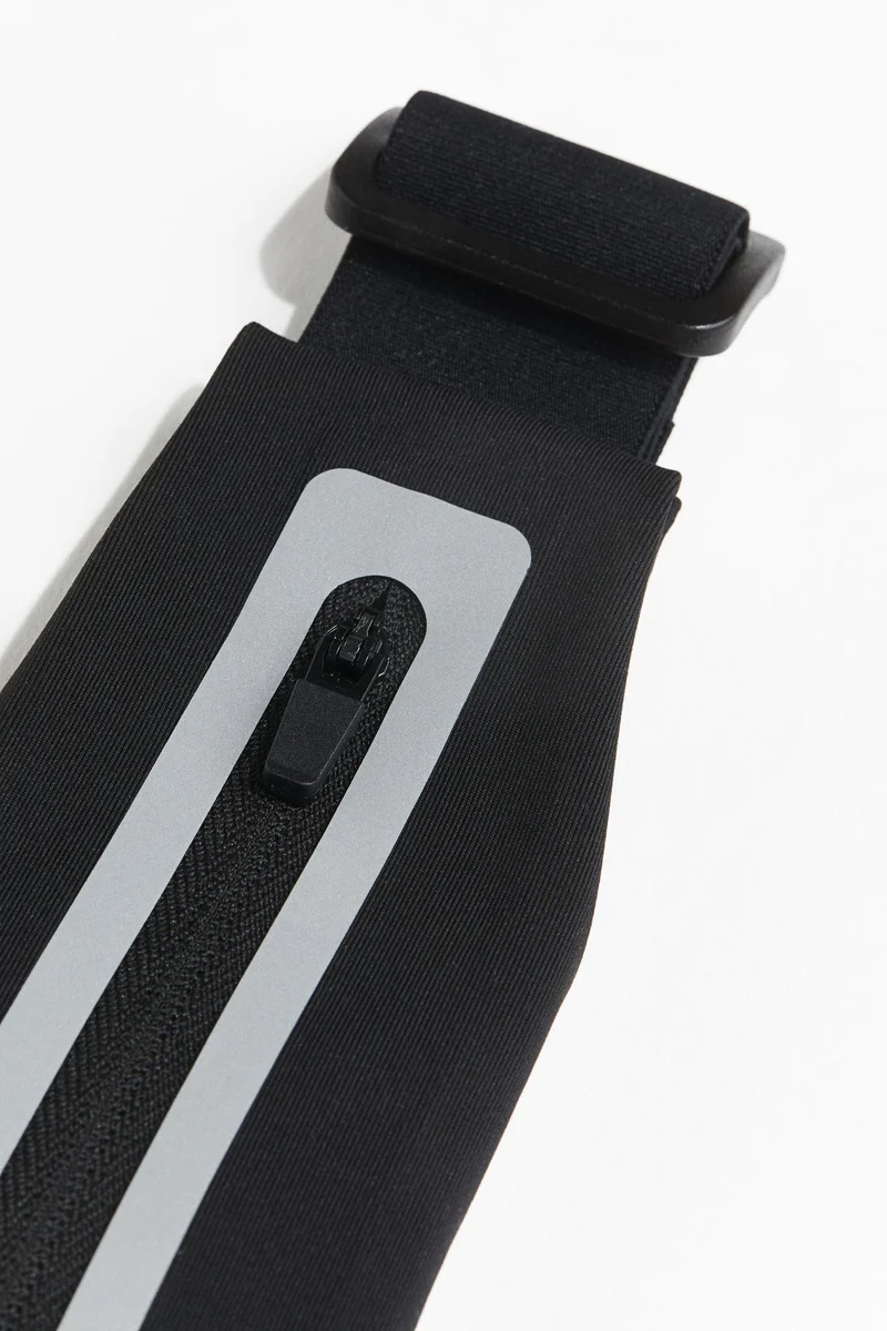 اتش اند ام حقيبة خصر للركض