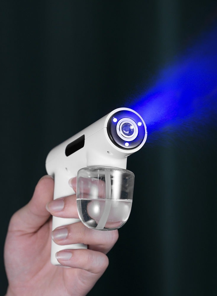 Portable handheld electric humidification spray gun household travel good nano atomization blue light disinfection gun - Image 5