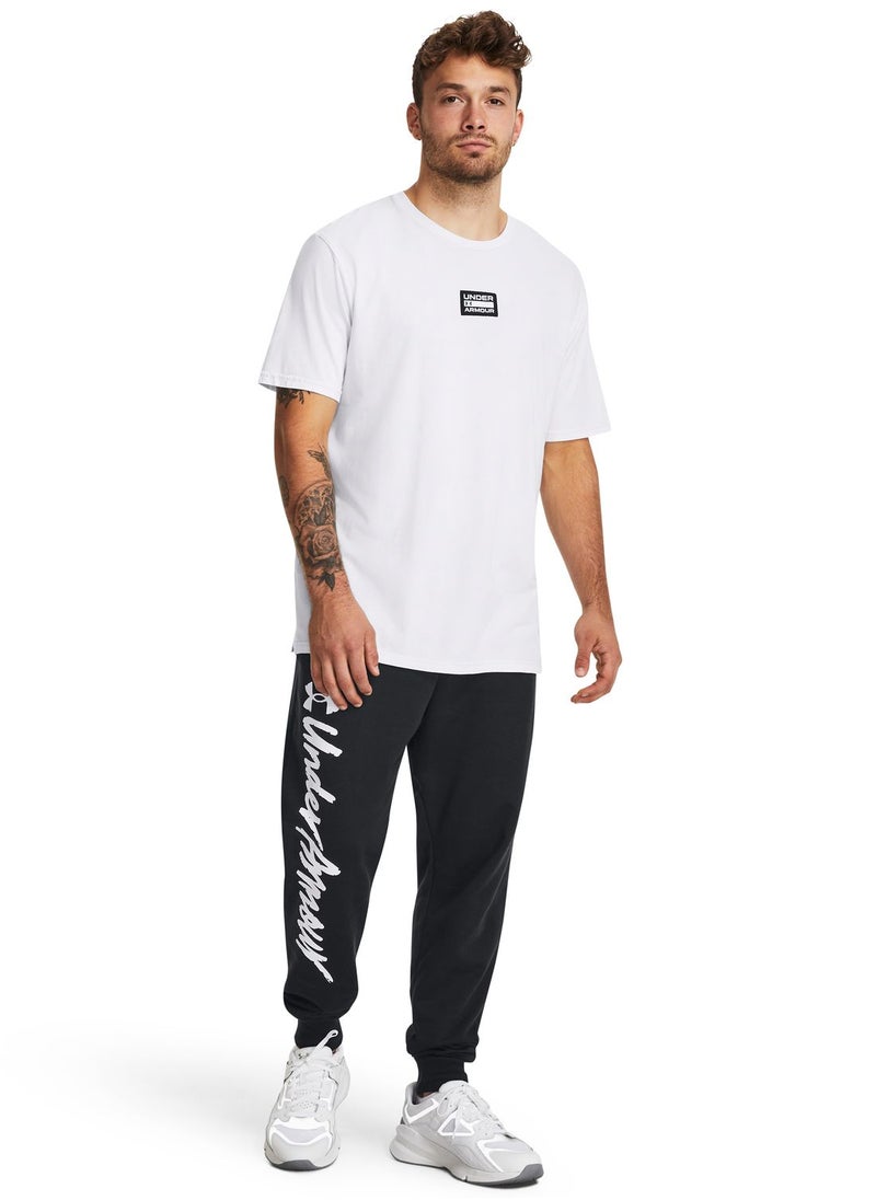 UNDER ARMOUR - Rival Fleece Graphic Joggers - Image 1