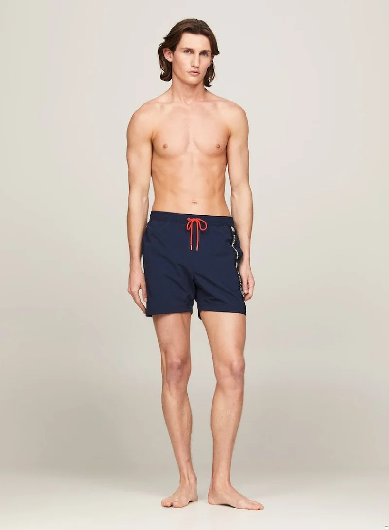 TOMMY JEANS Men's Logo Tape Mid Length Slim Swim Trunks - Nylon, Blue
