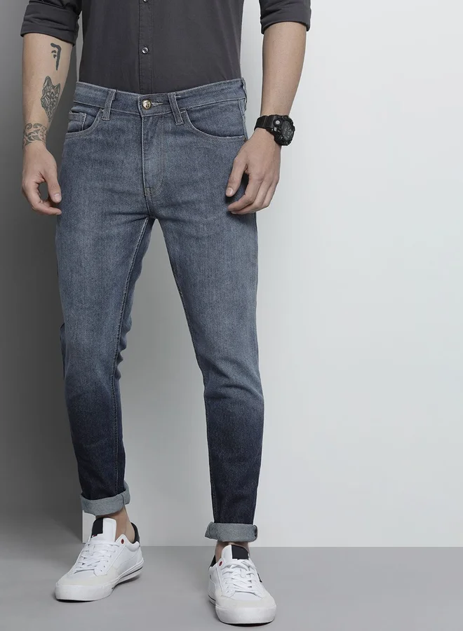 شركة المرآب الهندية جينز مشطوف غامق بقصة ضيقة