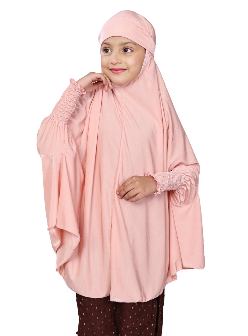 ICW Girls' Prayer Polyknit Jersey Islamic Long-Sleeves with Smocking Jilbab Khimar MakhanaHijab For Kids (Peach, 3-7 Years (36 inch Lenght)) - Image 1