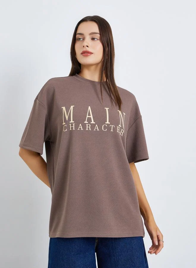 Women Beige Slogan Oversized T-Shirt