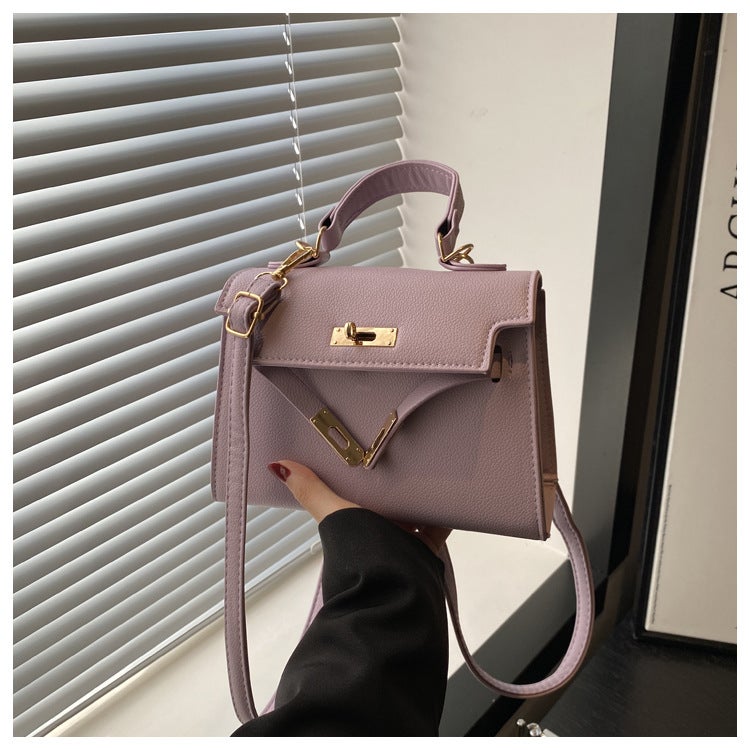 2024 New Mori Bag Womens Fashion Texted Portable Kelly Bag Shoulder Crossbody Bag This Years Popular commuter Bag Purple - Image 1