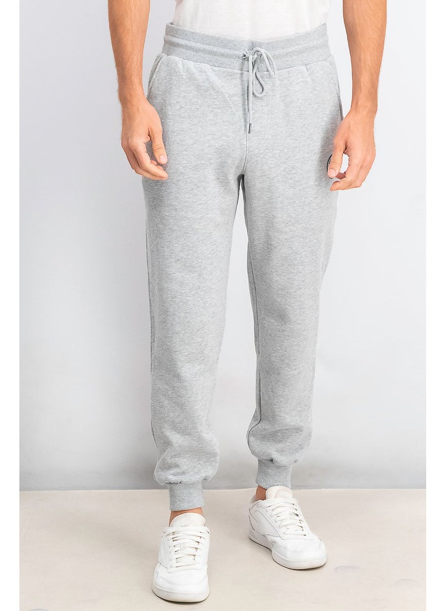 TRUE RELIGION - Men Graphic Printed Drawstring Jogger Pants, Heather Grey - Image 1