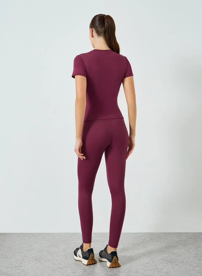 Styli Active  Stitch Detail Short Sleeves Top And Leggings Set for Women | Best Price UAE